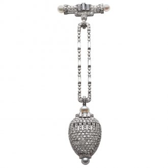 Swiss platinum Amphora-shaped Art Deco lapel watch Circa 1927