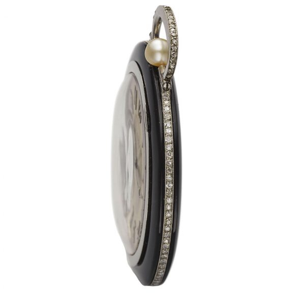 Swiss white gold, onyx and diamond dress watch Circa 1910 Swiss white gold, onyx and diamond dress watch Circa 1910