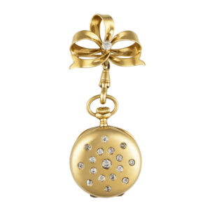 Swiss gold brooch watch set with 17 round white diamonds Circa 1890