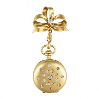 Swiss gold brooch watch set with 17 round white diamonds Circa 1890