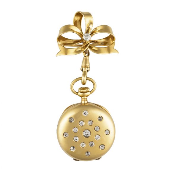 Swiss gold brooch watch set with 17 round white diamonds Circa 1890