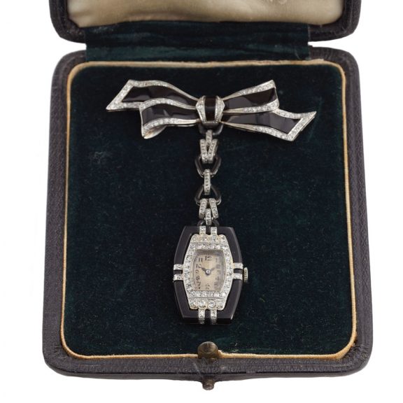 Swiss white gold Art deco tonneau shaped brooch watch Circa 1925 Swiss white gold Art deco tonneau shaped brooch watch Circa 1925