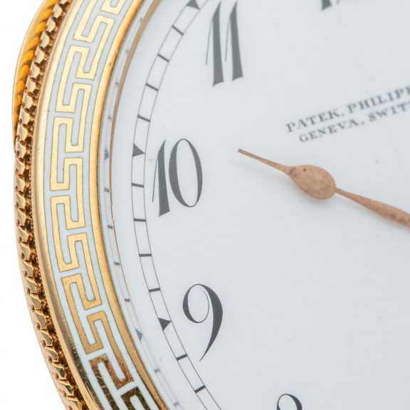 Swiss 18K gold and white enamel decorated pocket watch Circa 1900 Swiss 18K gold and white enamel decorated pocket watch Circa 1900