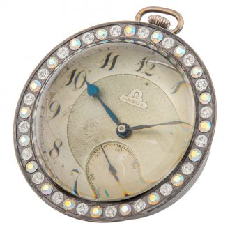 Swiss brass rhinestone set glass ball form watch Circa 1910
