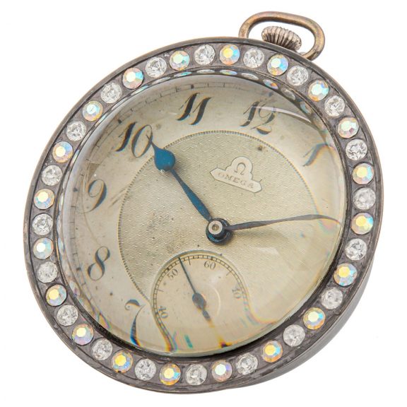 Swiss brass rhinestone set glass ball form watch Circa 1910