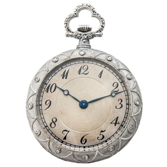 Elegant Swiss platinum pendant watch set with diamonds Circa 1910