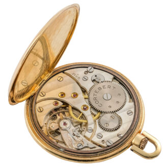 Swiss gold keyless lever watch with back dial Circa 1940