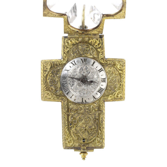 Swiss gilt brass watch in the shape of a crucifix Circa 1660 Swiss gilt brass watch in the shape of a crucifix Circa 1660
