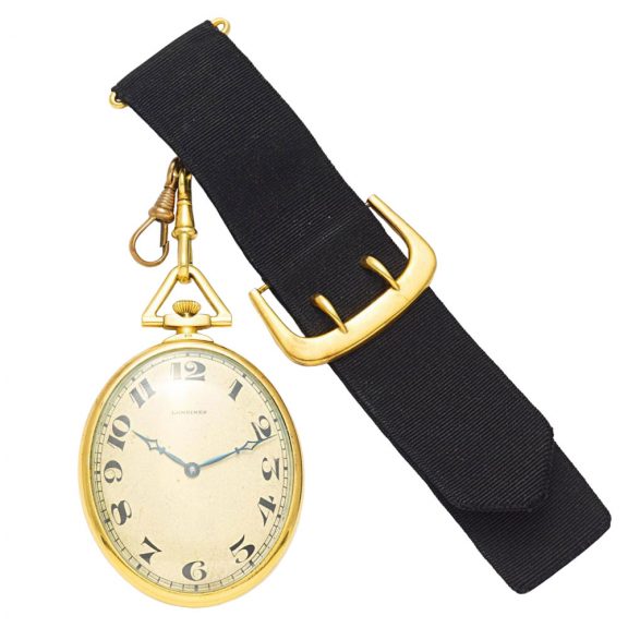 Swiss 18 carat gold open faced oval watch with chatelaine Circa 1930