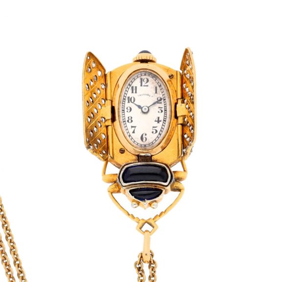 Swiss gold oval watch in custom made beetle form case Circa 1930