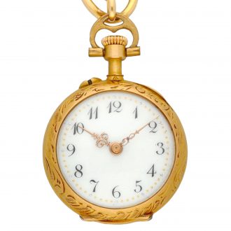 Swiss gold and enamel lady's lapel watch with pin Circa 1920