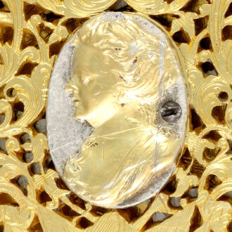 A silver English verge with Portrait of Queen Anne Circa 1695