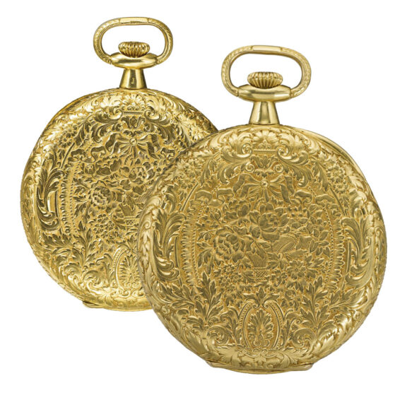 A gold Swiss hunting cased watch with engraved case Circa 1919