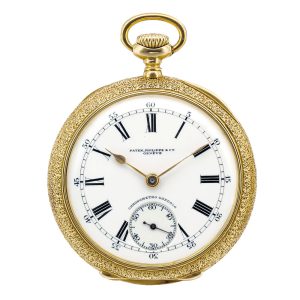 A gold Swiss enamel open faced keyless lever watch Circa 1905