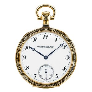 A gold Swiss enamel open faced keyless lever watch Circa 1920
