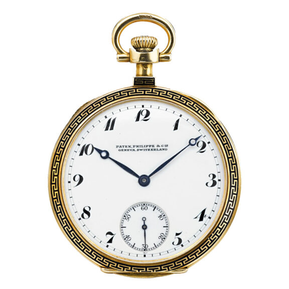 A gold Swiss enamel open faced keyless lever watch Circa 1920