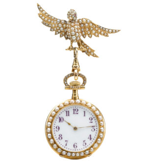 A gold Swiss seed pearl and colored gem-set watch Circa 1900