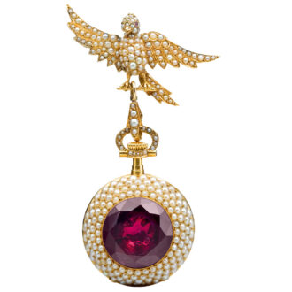 A gold Swiss seed pearl and colored gem-set watch Circa 1900