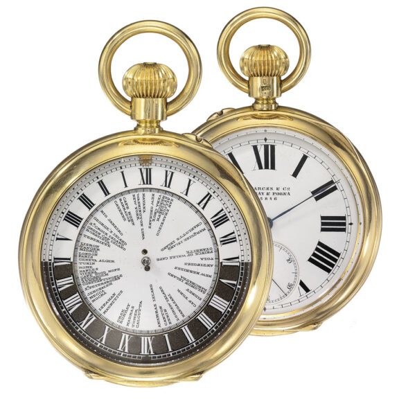 An 18k gold English double dialed world time watch Circa 1910