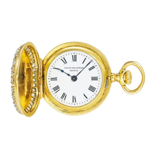 Swiss gold enamel and diamond-set miniature watch Circa 1889 Swiss gold enamel and diamond-set miniature watch Circa 1889