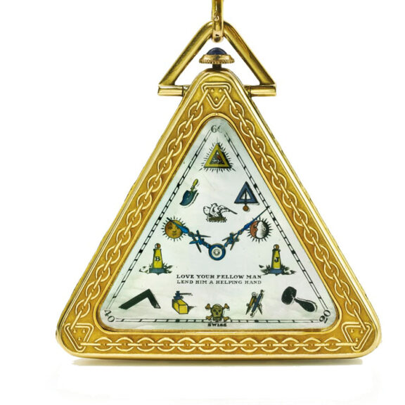 Swiss 14K gold triangular watch with Masonic motifs Circa 1935