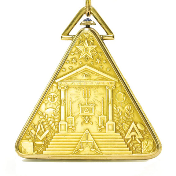 Swiss 14K gold triangular watch with Masonic motifs Circa 1935 Swiss 14K gold triangular watch with Masonic motifs Circa 1935