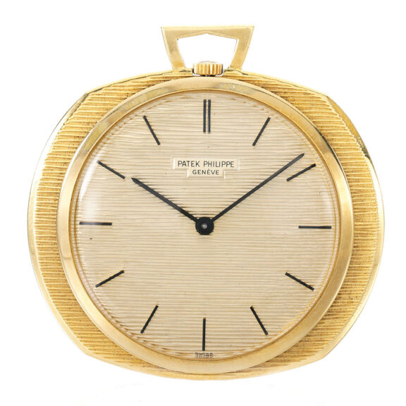A fine Swiss unusual gold open faced keyless watch Circa 1970