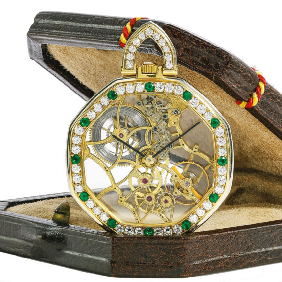 A Swiss emerald and diamond set skeletonised watch Circa 1995