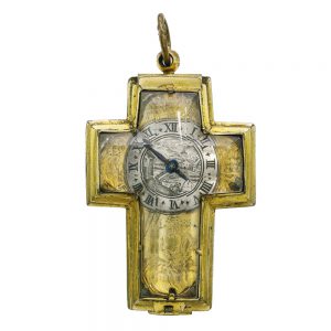 A French rock crystal and brass cross shaped watch Circa 1630